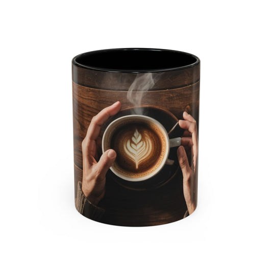 mug with coffee design in tired hands