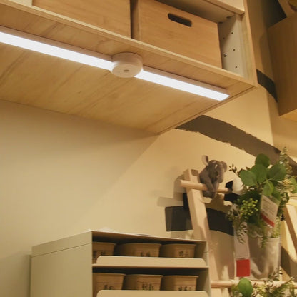 "Enhance your home with this Intelligent Cabinet Light. Features motion sensor, foldable design, adjustable brightness, and multi-color options."